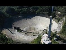 AERIAL VIEWS of the giant Arecibo telescope after its collapse