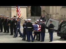 The coffin of George H.W. Bush arrives at the Cathedral