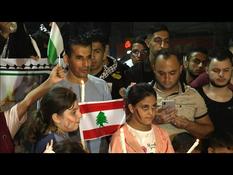 Palestinians participate in candle vigil for Lebanon