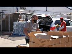 Facing shortages, Houston residents rush to food distributions