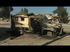 Haiti: Demonstrators burn a police vehicle