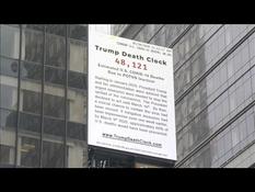 In New York, a panel displays the "Trump Death Clock"