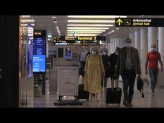 Images of passengers at Copenhagen airport as restrictions ease