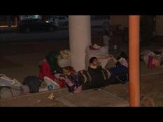 At the Greek-Turkish border, migrants prepare to sleep outside