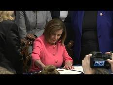 Pelosi signs the indictment before it is transmitted to the Senate