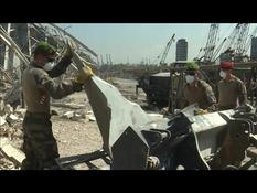 In Beirut, French and Lebanese soldiers cleared tons of debris on the ravaged port