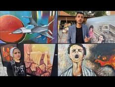 Palestinian artists exhibit paintings inspired by the bombing of the Gas Strip