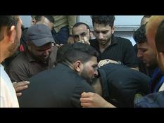Relatives of one of the Palestinians killed gathered in hospital