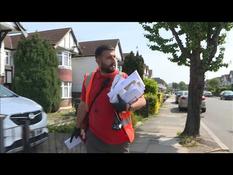 "An important service at a difficult time": a London postman says he is proud to work pendan