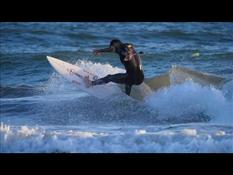 "Like the first time": Italian surfers go back to the waves