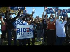 Biden supporters celebrate victory in front of Wilmington centre where he will give his speech