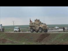 Syria: US and Russian military vehicles patrol along the M4 motorway